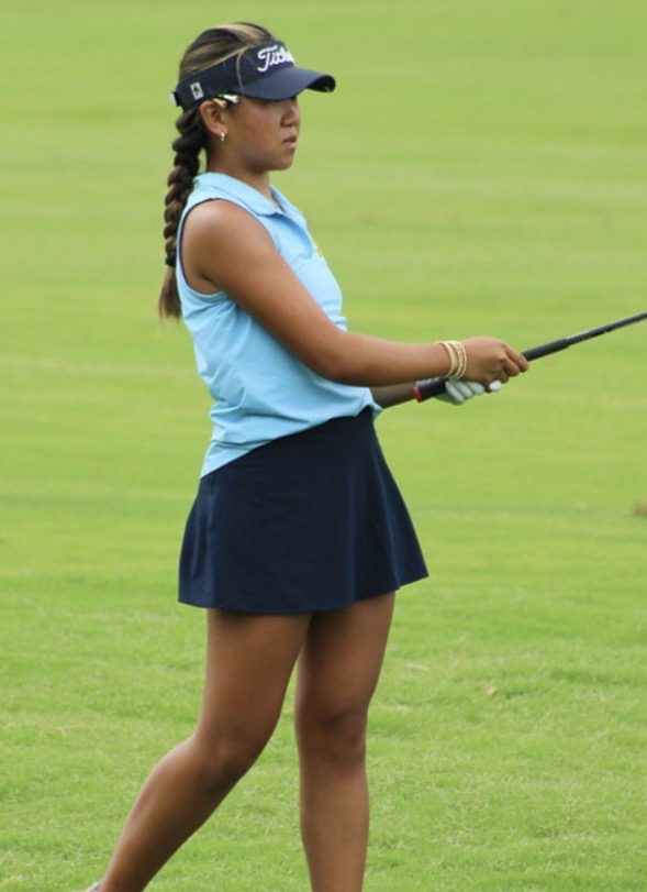Jackie Zhuang watching a shot on the course